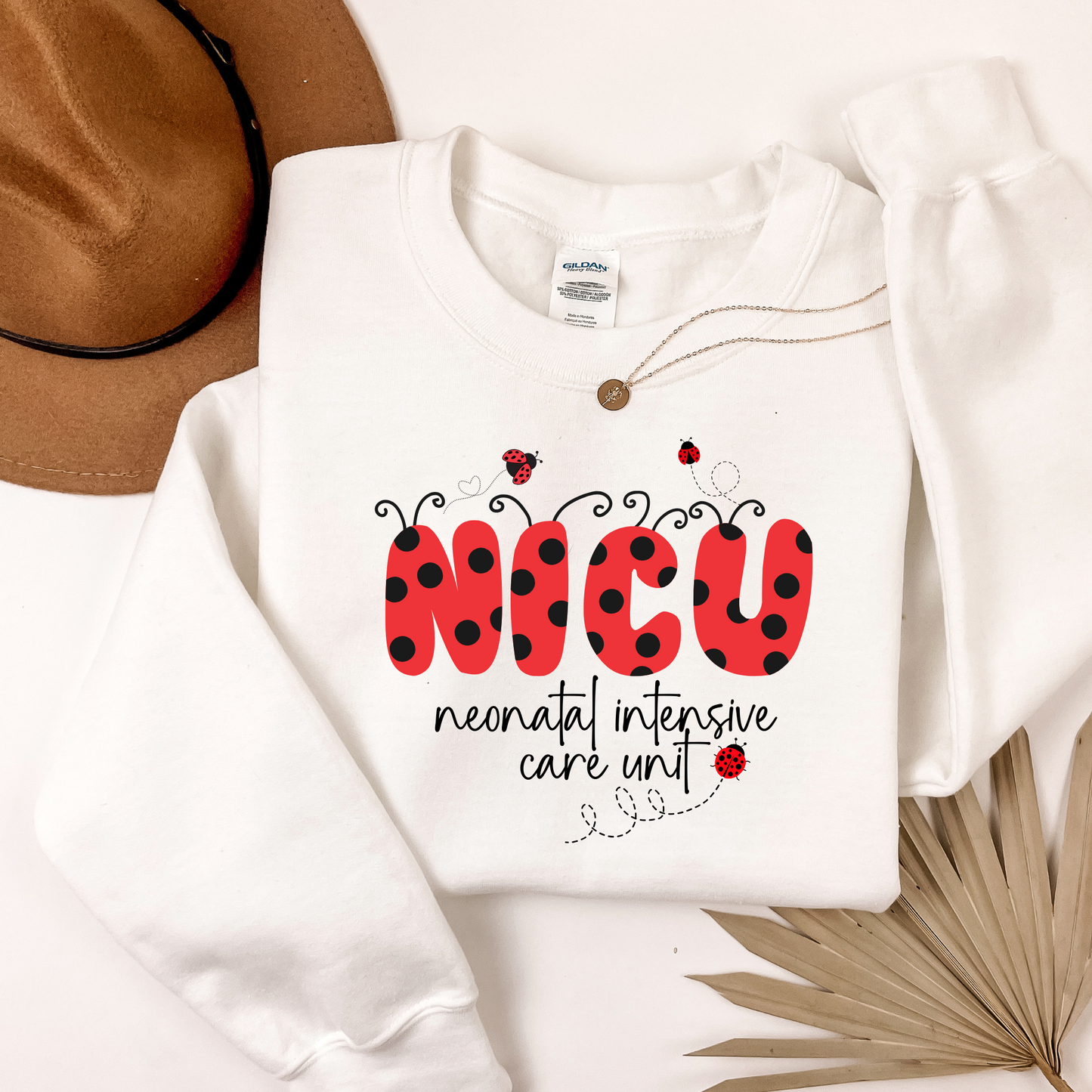 Ladybug NICU nurse crewneck sweatshirt