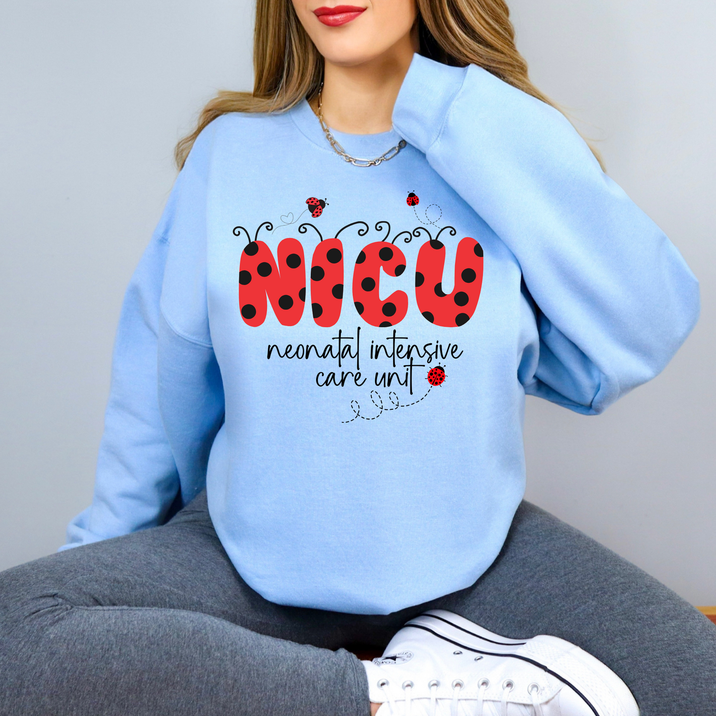 Ladybug NICU nurse crewneck sweatshirt