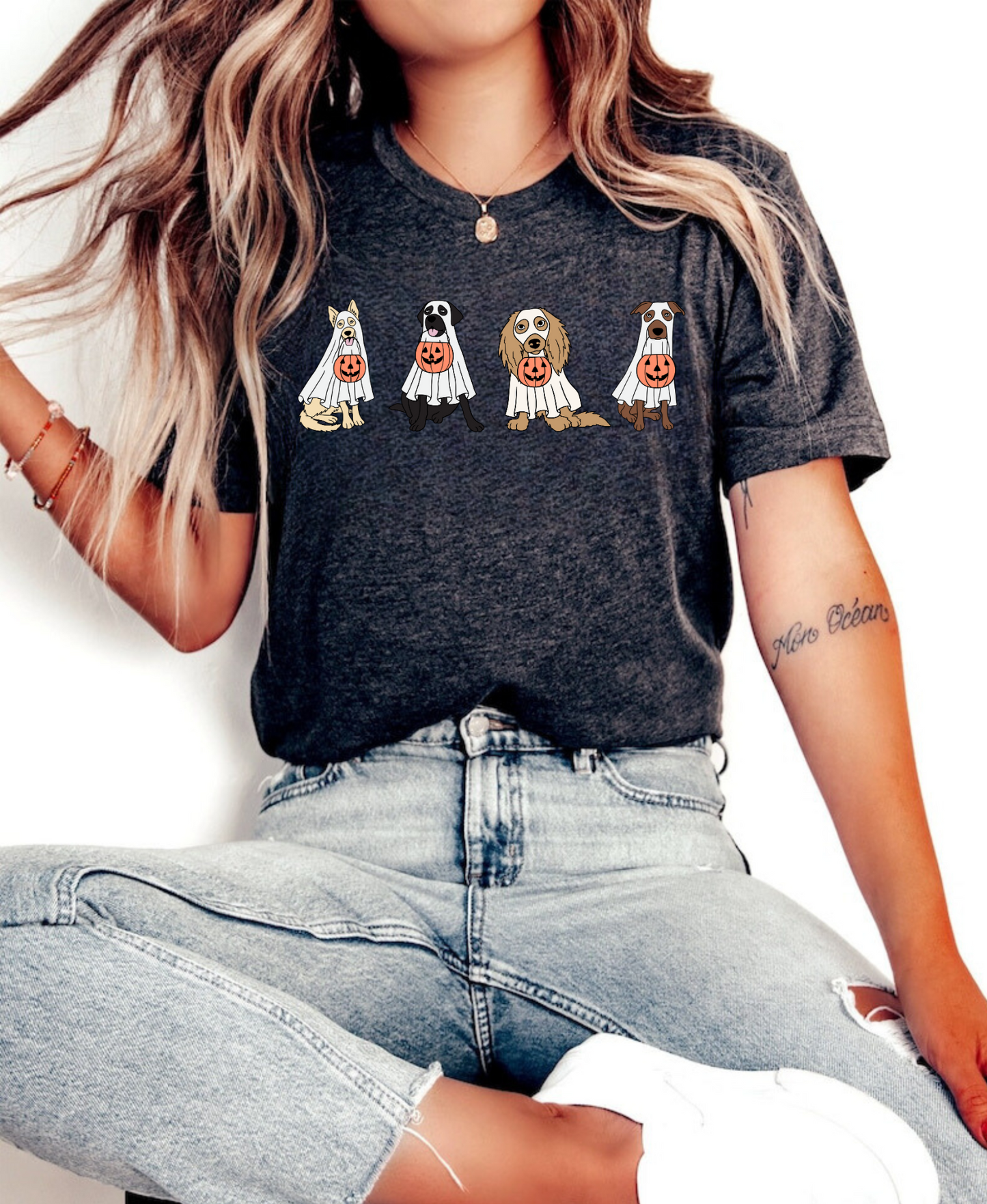 An oversized comfort colors shirt adorned with charming ghost dogs, capturing the essence of a cute and spooky Halloween. Ideal for dog lovers, this trendy shirt brings a touch of autumn to your wardrobe, making it a must-have for the fall season.