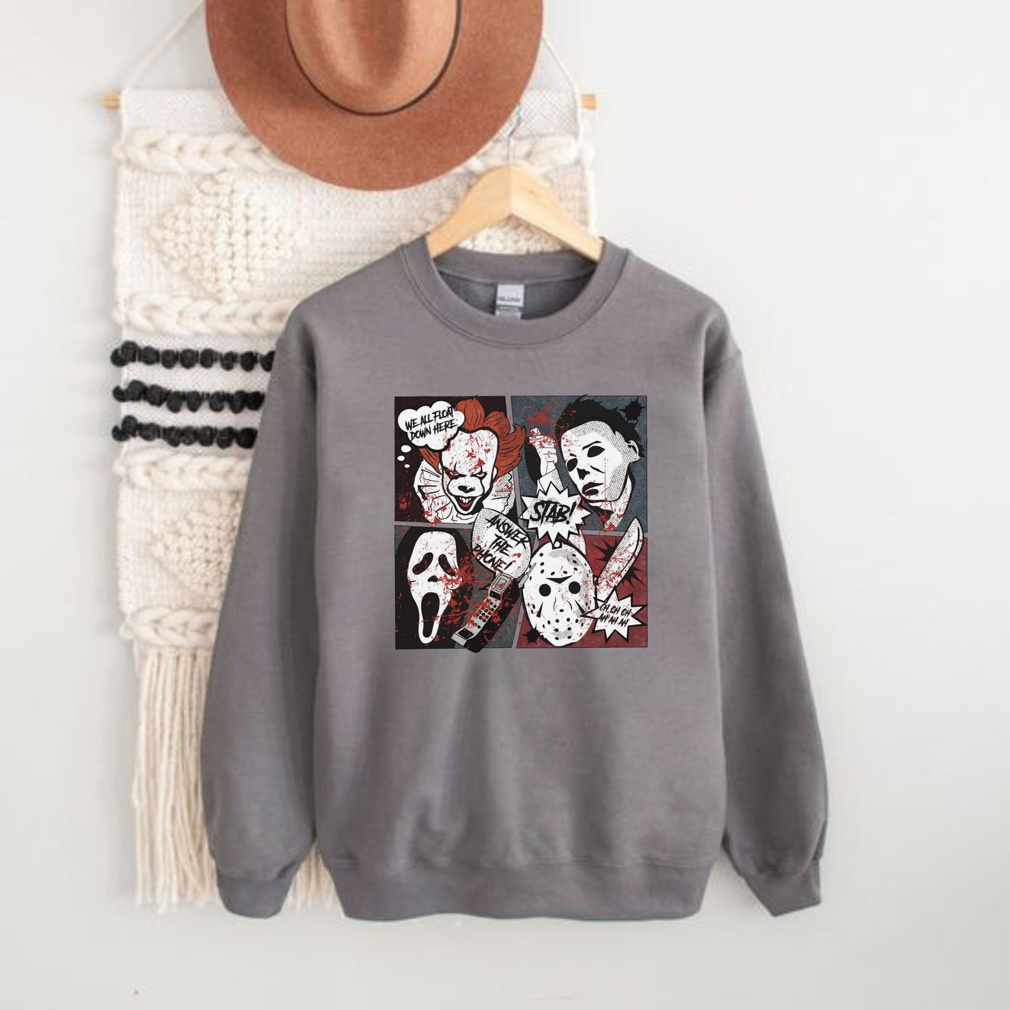 A Halloween horror movie crewneck sweatshirt for women featuring a retro-inspired design with a spooky and comic book aesthetic.
