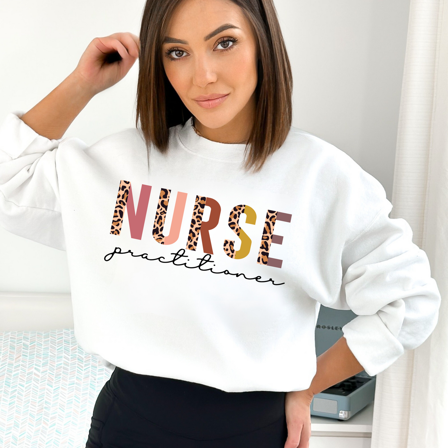 Leopard print nurse practitioner crewneck sweatshirt.