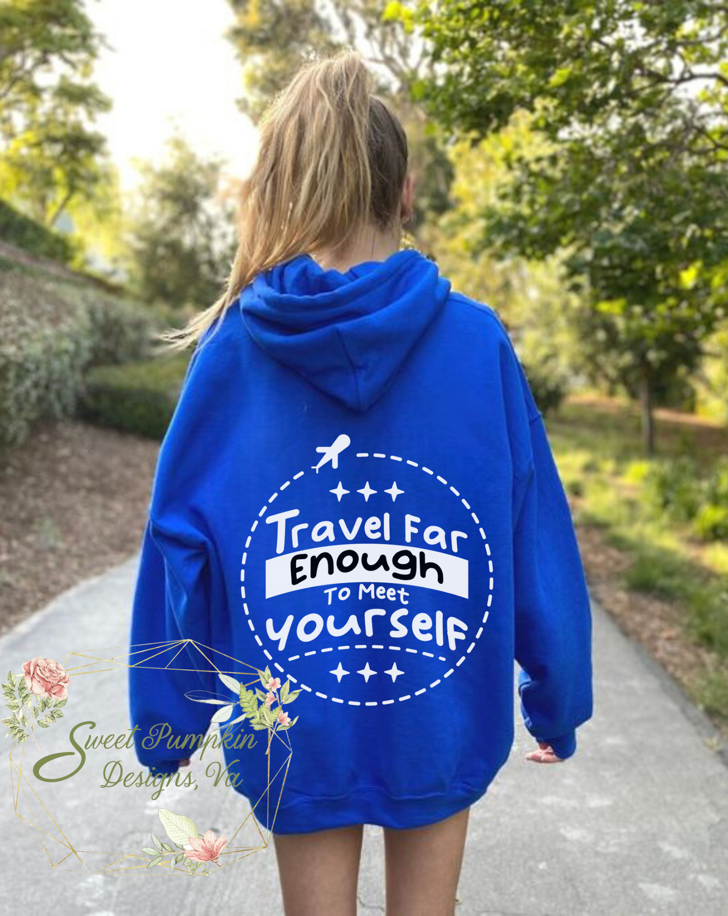 Oversized travel hoodie for women with travel aesthetic, wanderlust vibes, and high-quality materials.