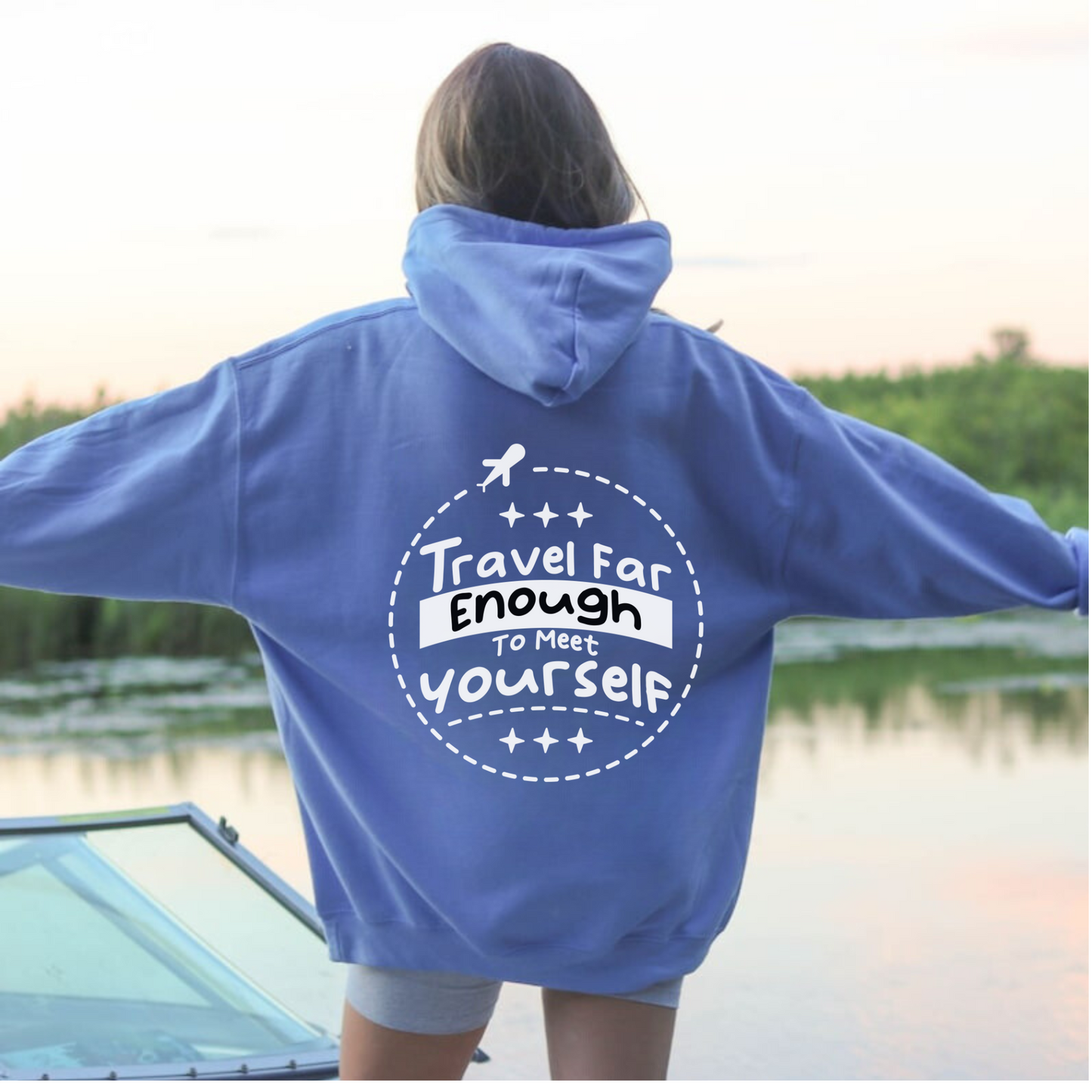 Oversized travel hoodie for women with travel aesthetic, wanderlust vibes, and high-quality materials.