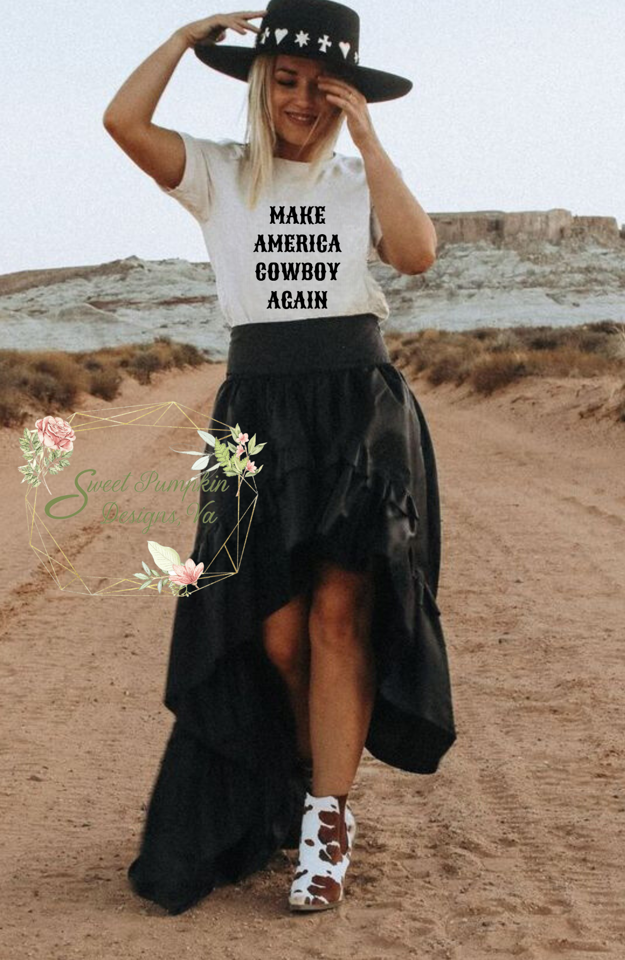 An image of a white t-shirt with the phrase 'Honky Tonk Babe' printed in bold black letters. The t-shirt is perfect for country music festivals and has a western aesthetic that appeals to coastal cowgirls.
