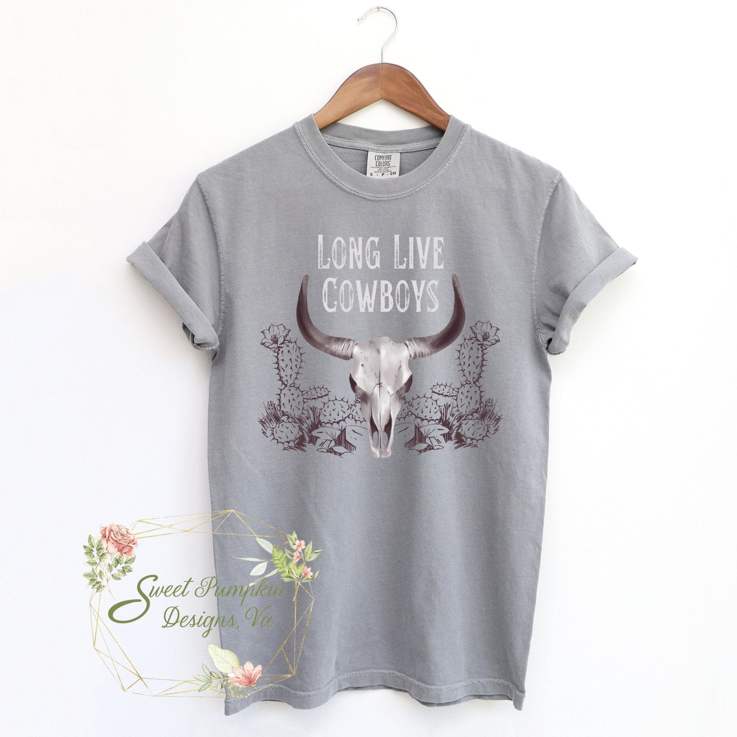 "Long Live Cowboys" vintage western t-shirt with a rustic cow skull and cacti design. Perfect for rodeo and Wild West enthusiasts. Made from high-quality material, this shirt is both comfortable and durable for everyday wear or special occasions.