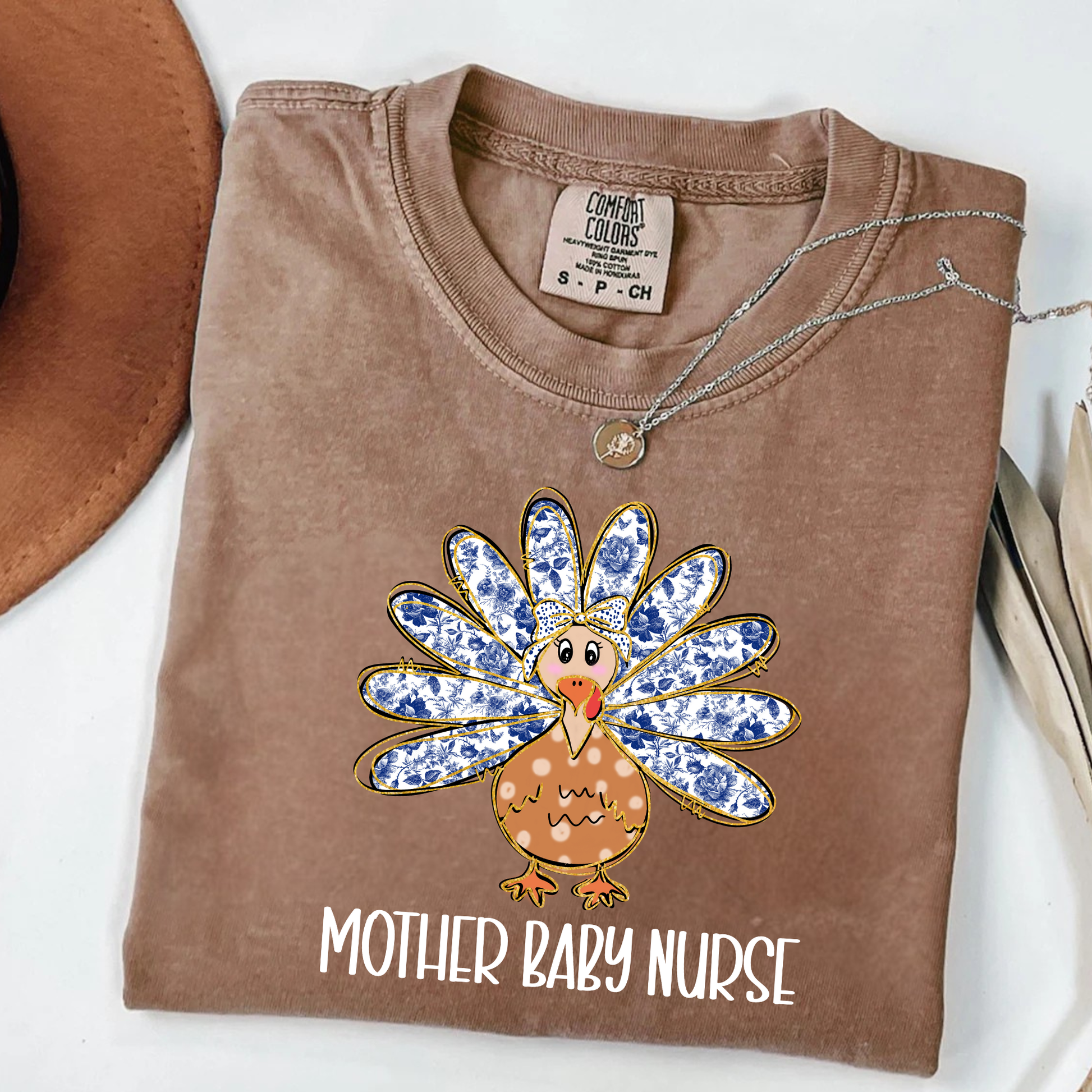 Comfort Colors Thanksgiving Mother Baby Nurse Shirt featuring cute turkey design, perfect for L&D, NICU, and postpartum nurses.
