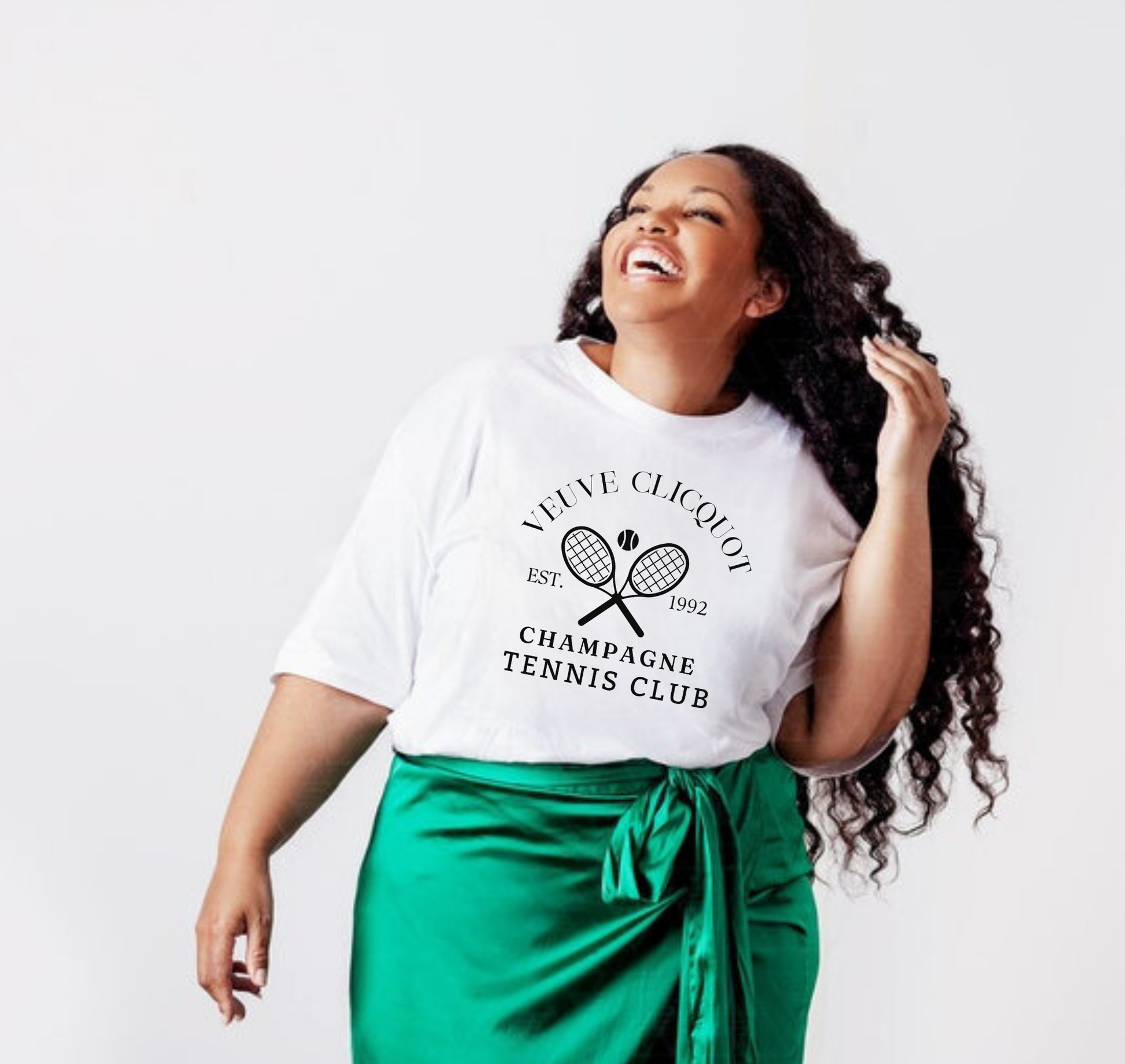 A champagne tennis shirt with a classic and preppy design, perfect for a sophisticated summer outfit.