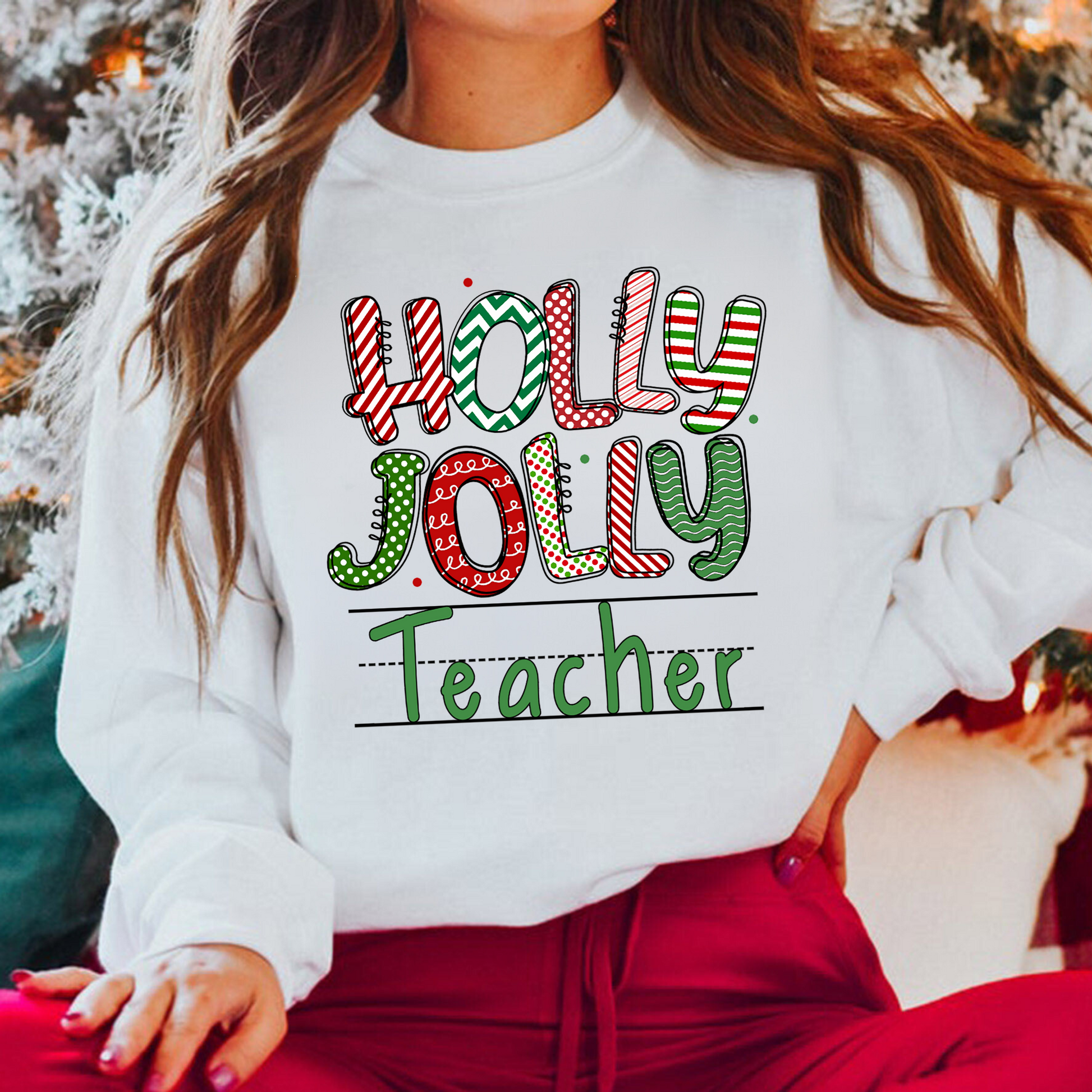 A cute and trendy 'Holly Jolly Teacher' Retro Christmas sweatshirt, perfect for embracing the festive season with a touch of retro charm. The sweater is designed for teachers who want to add holiday cheer to their winter style.