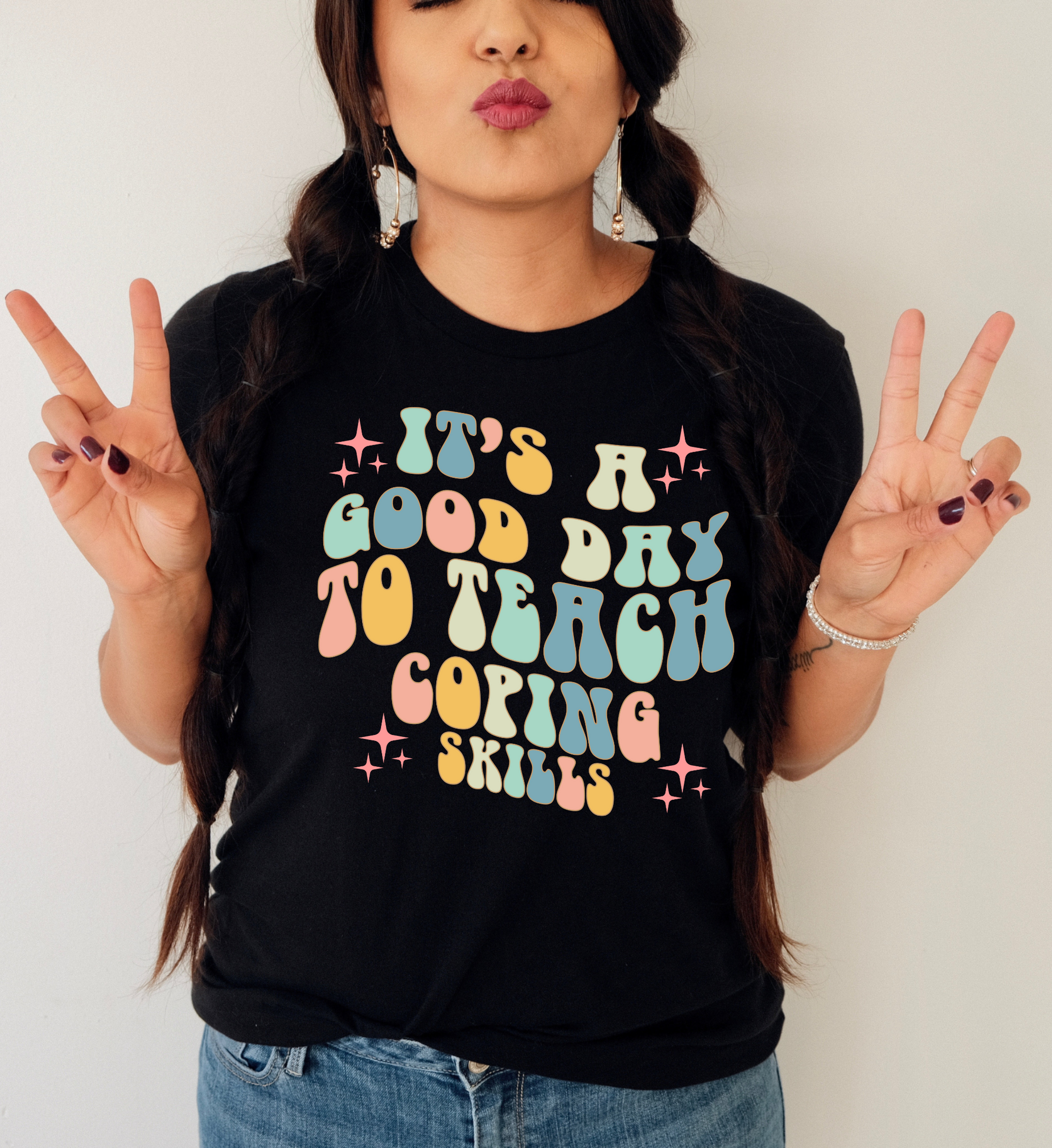 "It's a Good Day to Teach Coping Skills" T-Shirt - Image of a vintage t-shirt with the phrase "It's a Good Day to Teach Coping Skills" in bold, colorful lettering, perfect for social workers, counselors, and special education teachers.