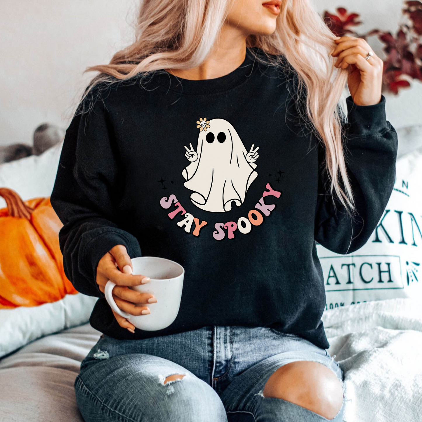 Our Retro Vintage Halloween Sweatshirt Crewneck with a cute hippie ghost design and "Stay Spooky" slogan is perfect for any Halloween enthusiast. Made with high-quality materials, this comfortable crewneck sweatshirt is durable and built to last. This sweatshirt is also a great gift for birthdays, holidays, or any special occasion. Show off your spooky side and add a touch of retro Halloween style to your wardrobe. Shop now and embrace the Halloween spirit!