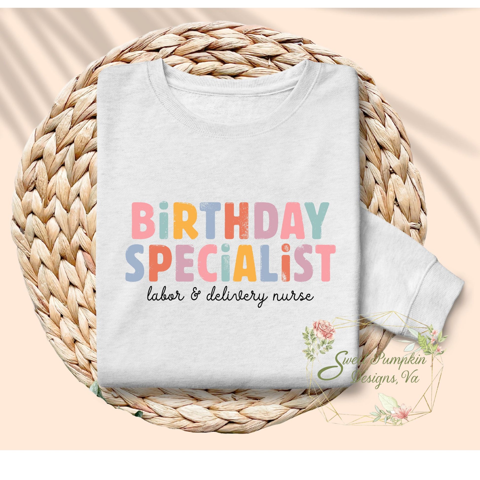  Image of a colorful and retro "Birthday Specialist" labor and delivery nurse sweatshirt, perfect for baby nurses, OB nurses, and labor and delivery nurses.